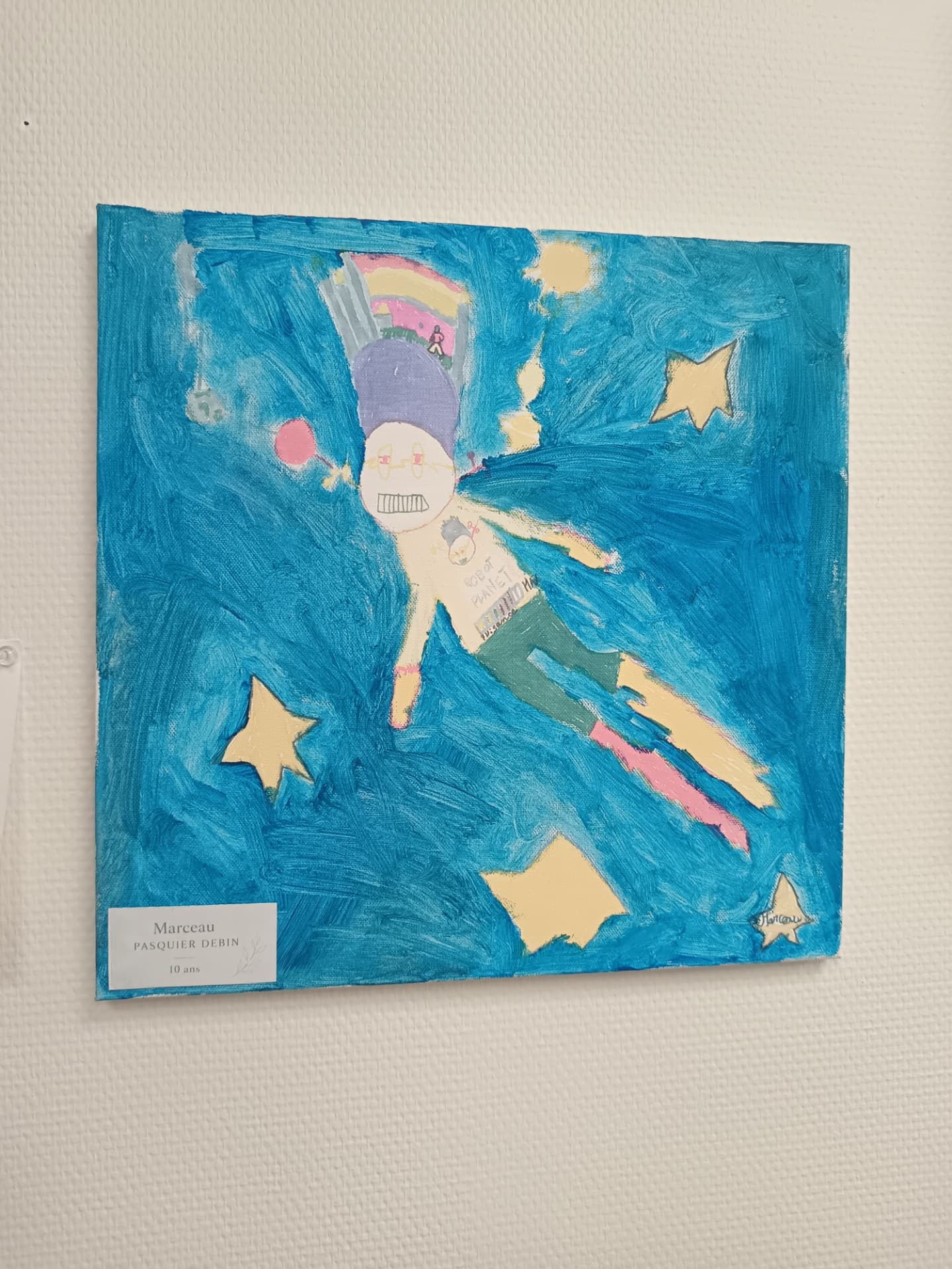 Peinture d'un personnage volant parmi les étoiles par Marceau, 10 ans