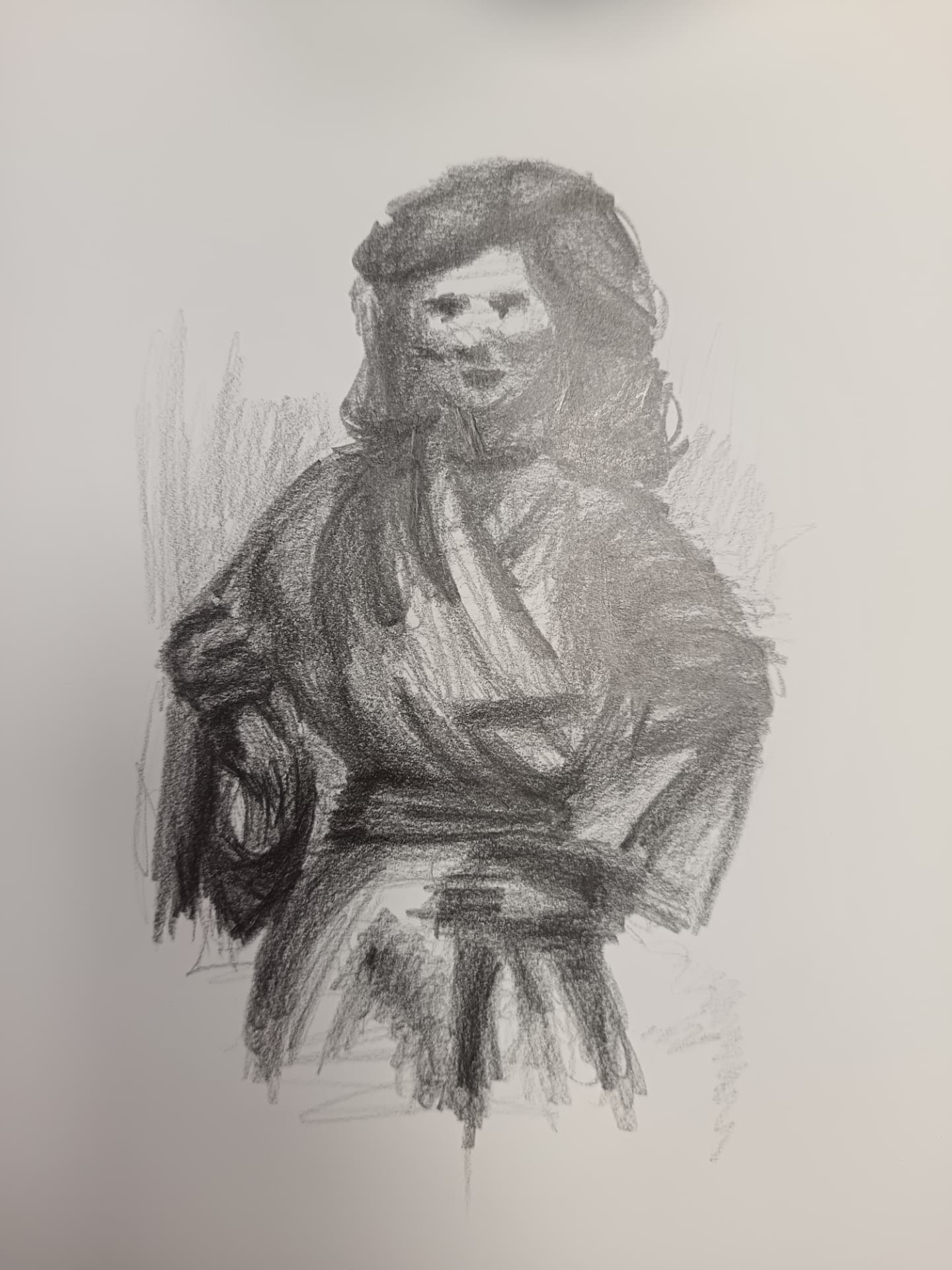 Dessin au crayon d'un portrait réalisé par un élève de l'atelier